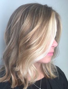 Blonde balayage with waves curls and highlights