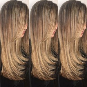 Longhair brunette going blonde with balayage