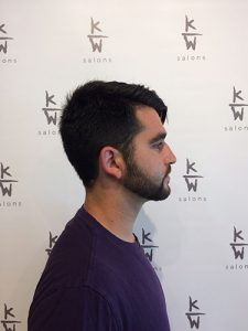 Men's modern fade cut with beard.